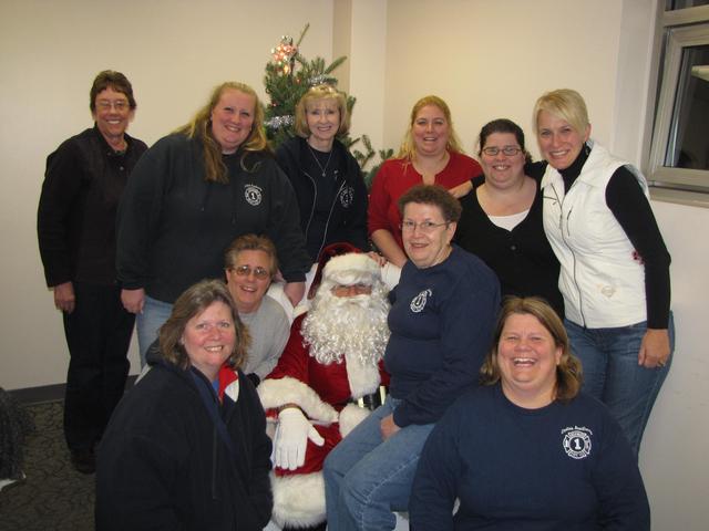 November 30, 2012: Members of the Westmont Fire Company Ladies Auxiliary with Santa after the Annual Township Parade of Lights.