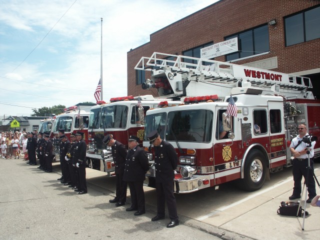 The officers of the Westmont Fire Company prepare to rehouse the apparatus.